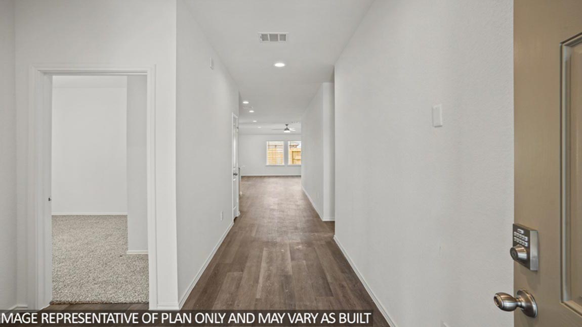 Entry hallway with vinyl flooring