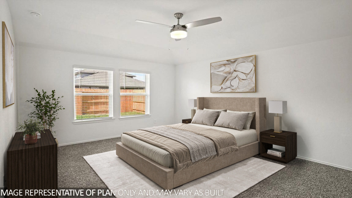 Primary bedroom with carpet flooring