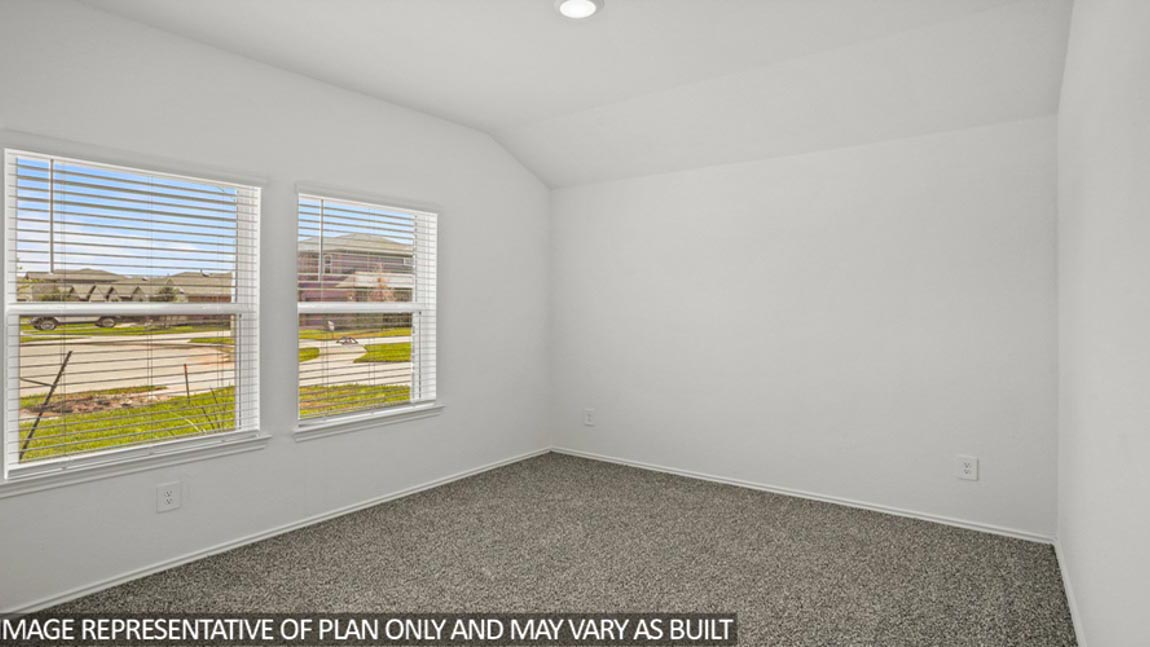 Secondary bedroom with bright window