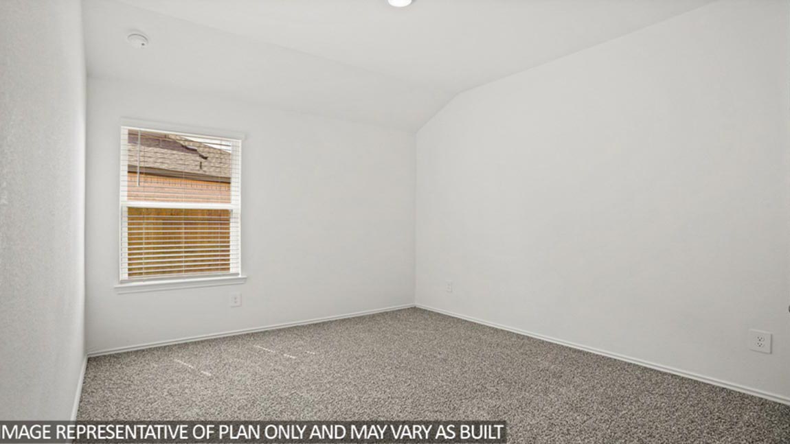 Secondary bedroom with bright window