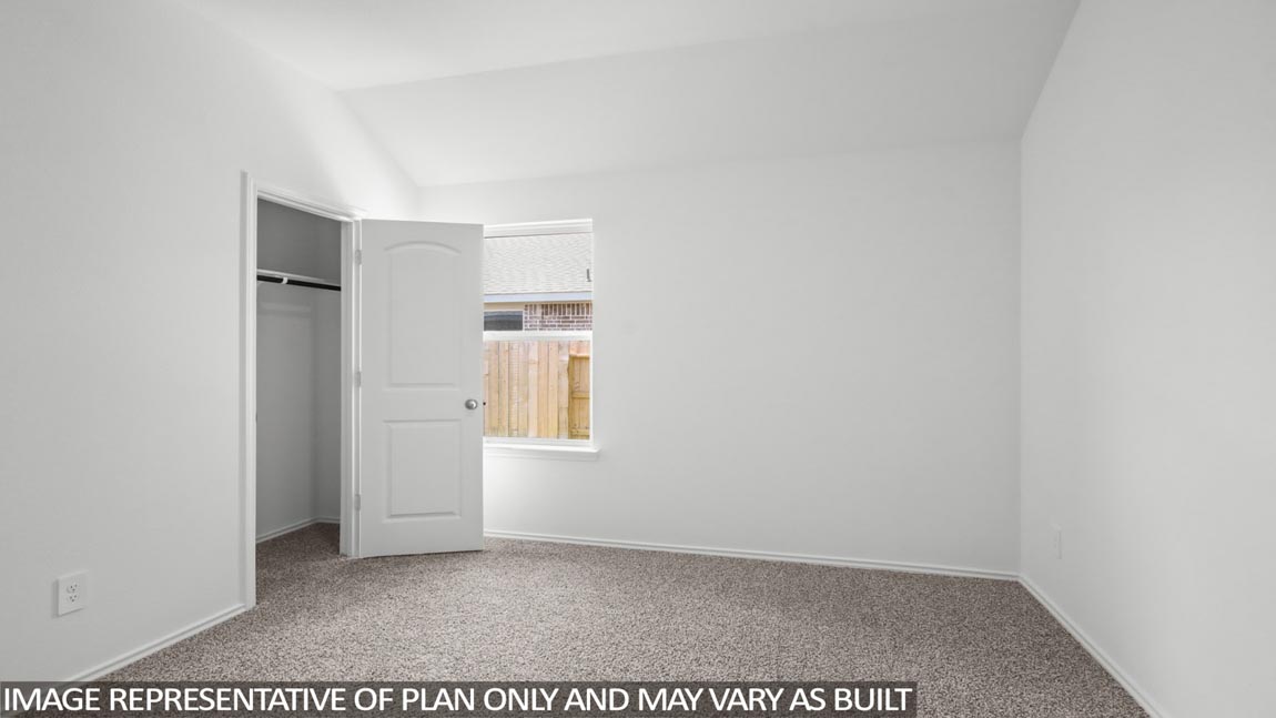 Secondary bedroom with bright window