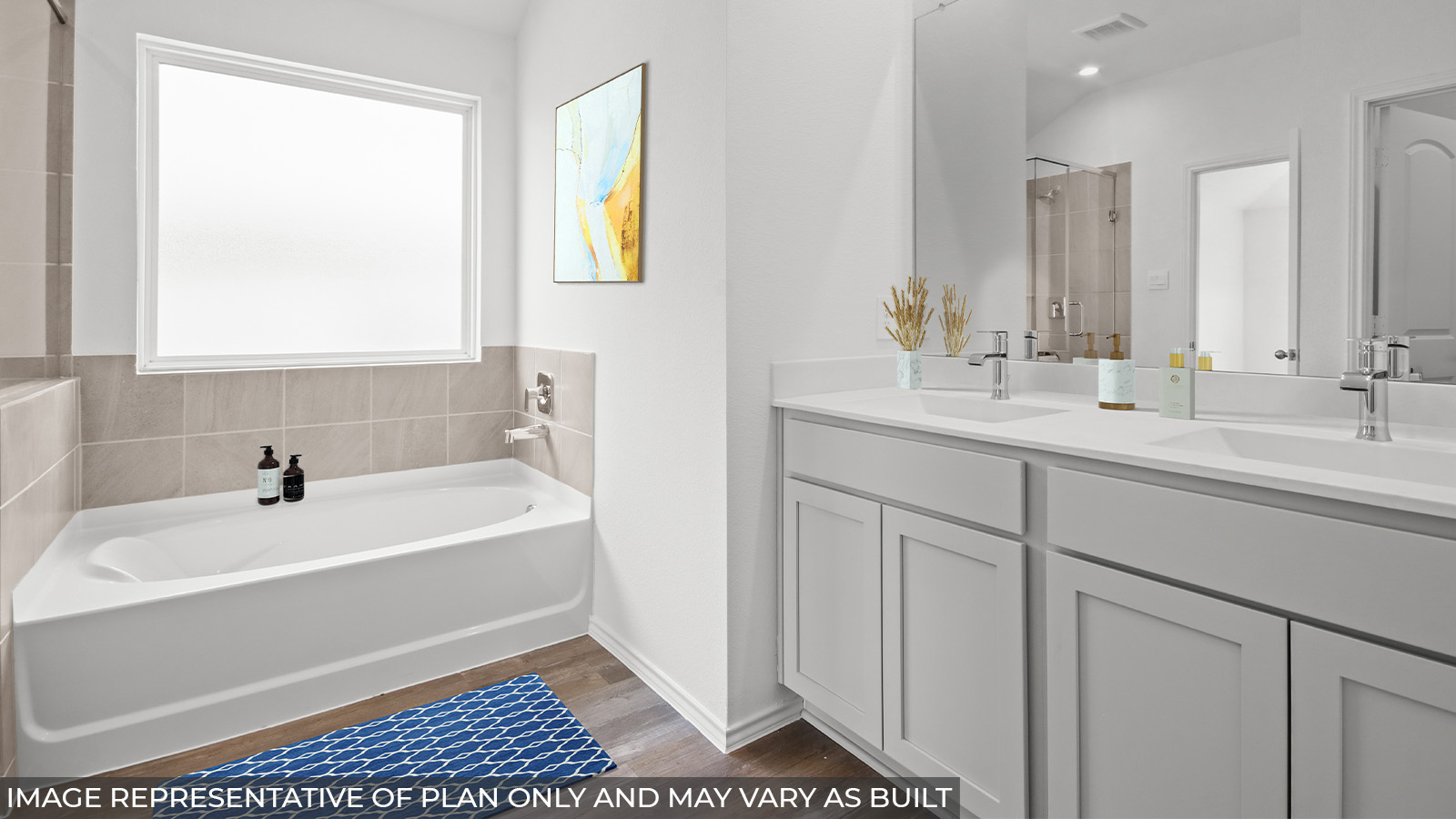 Primary bathroom with tub and shower