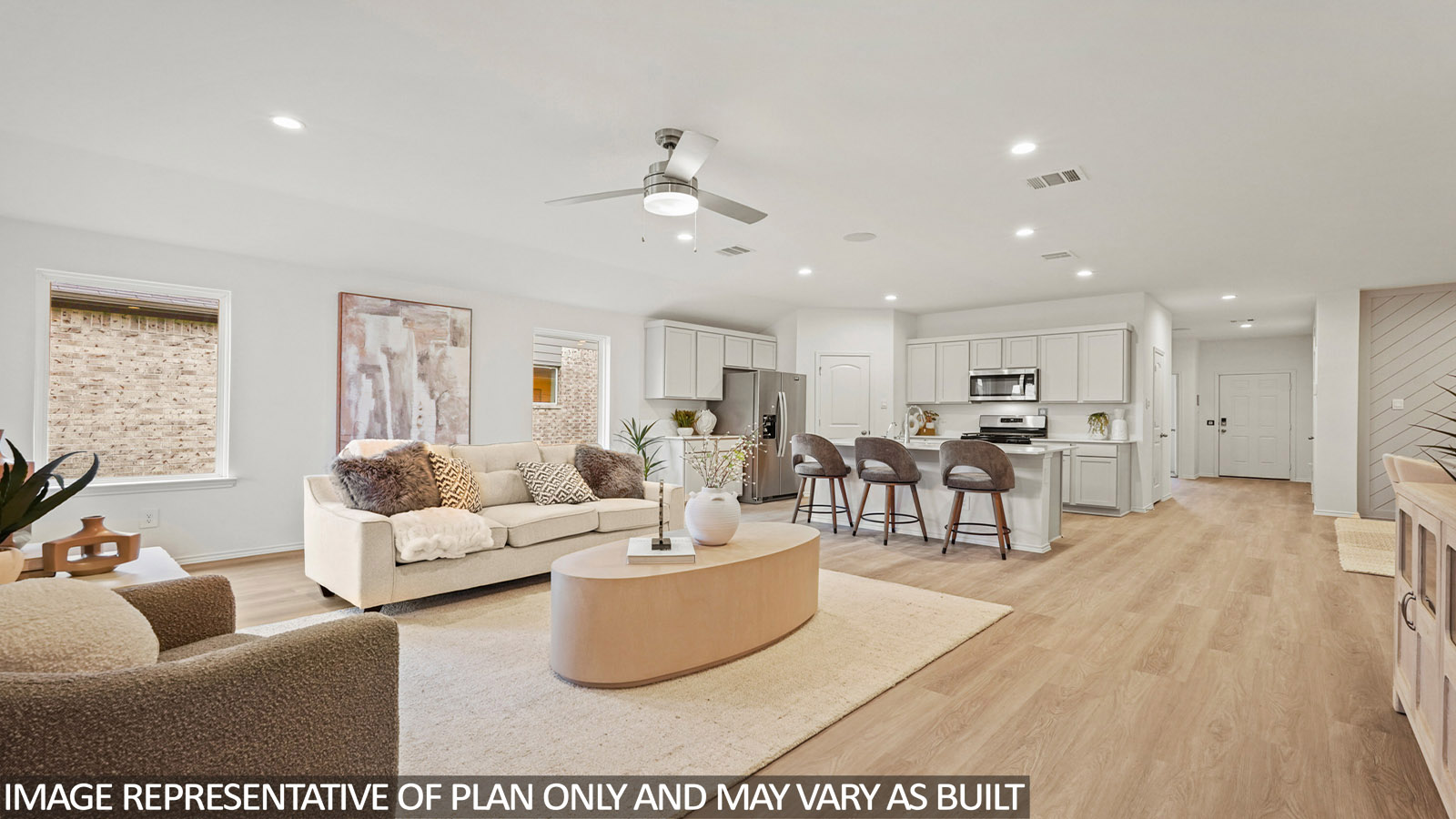 Open concept living, dining, and kitchen area