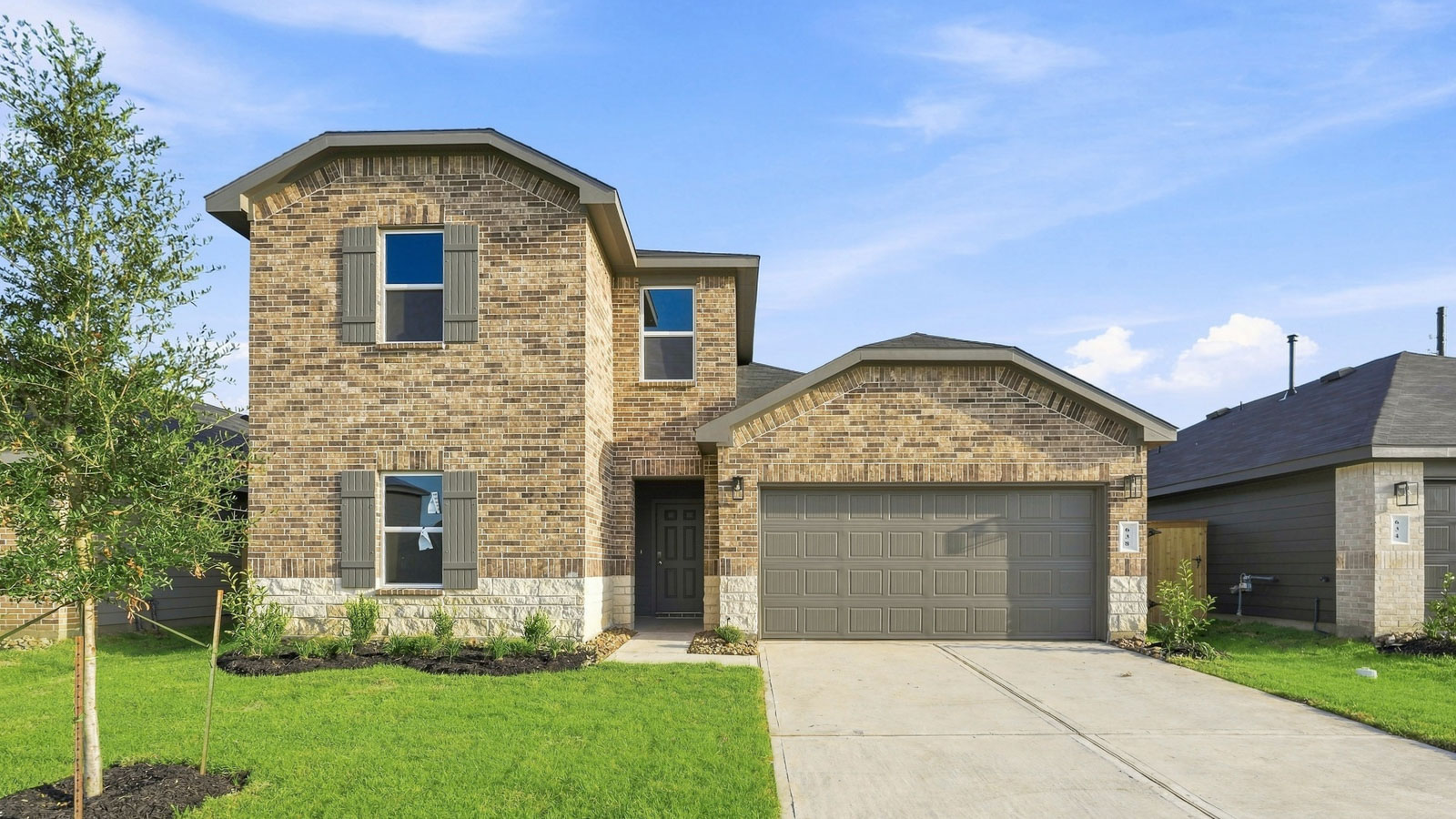 Two story home with two car garage
