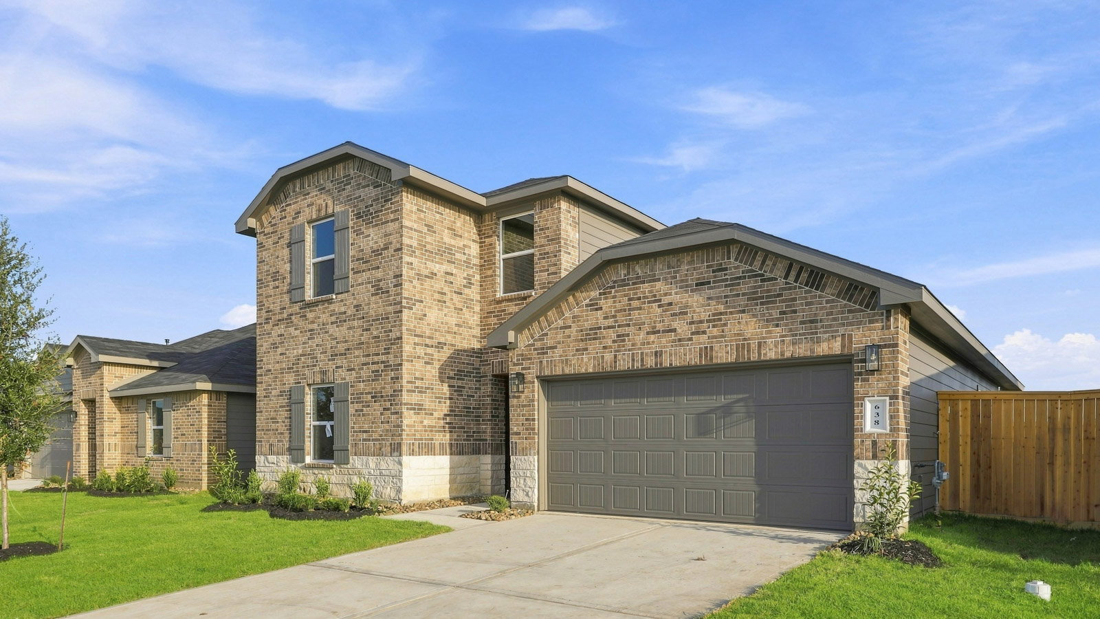 Two story home with two car garage