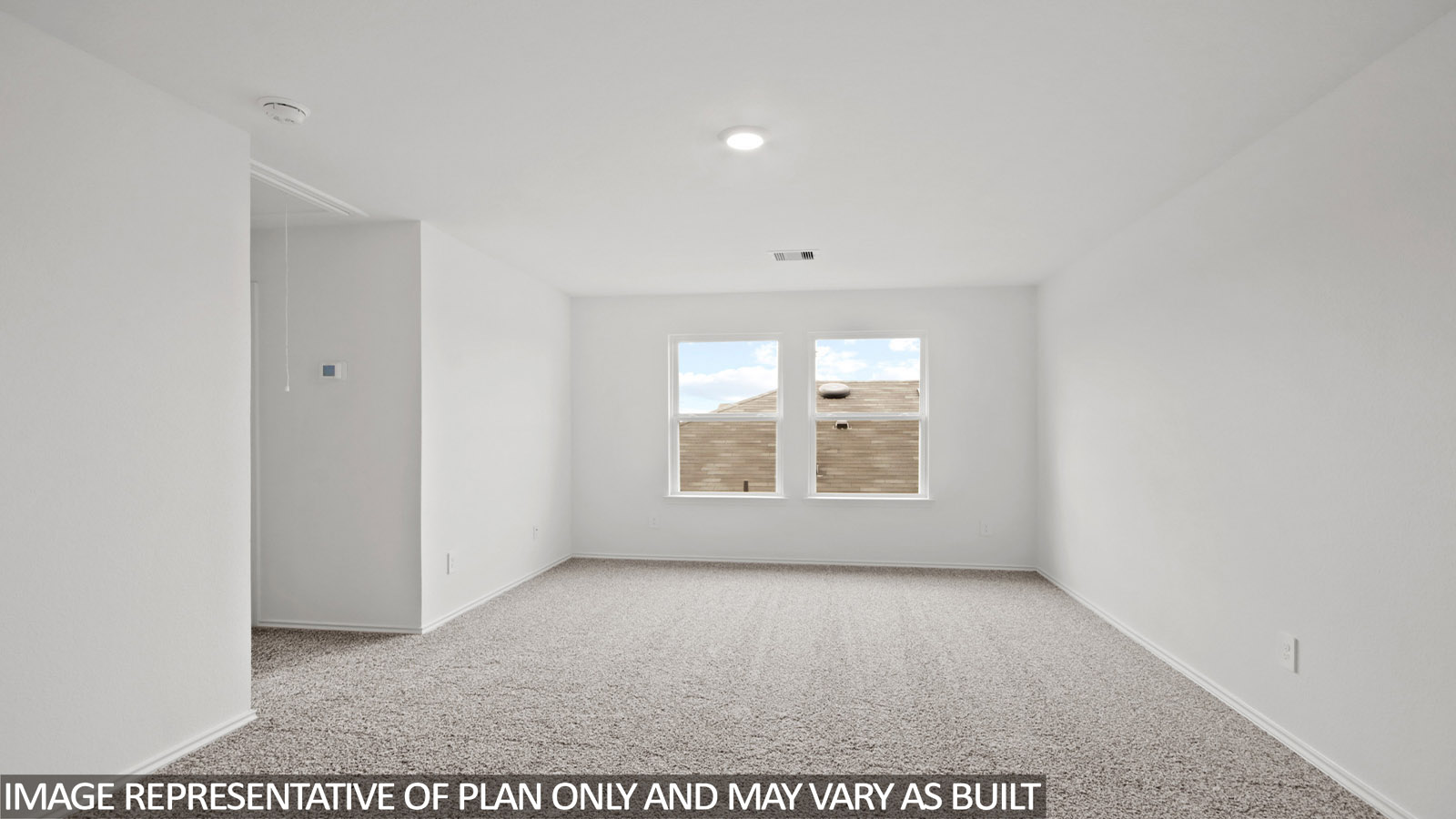 Second story game room with carpet flooring