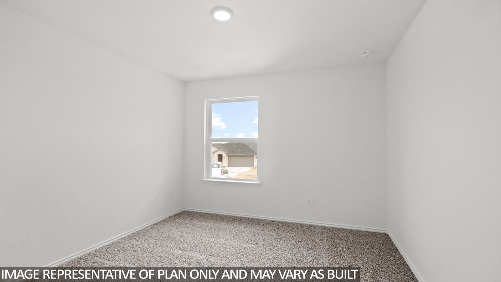 Secondary bedroom with bright window