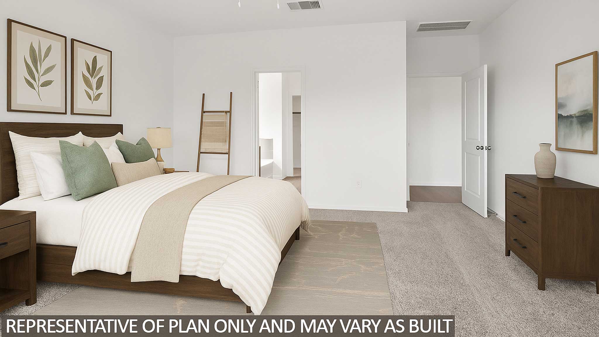 Staged primary bedroom with carpet flooring and bright windows.