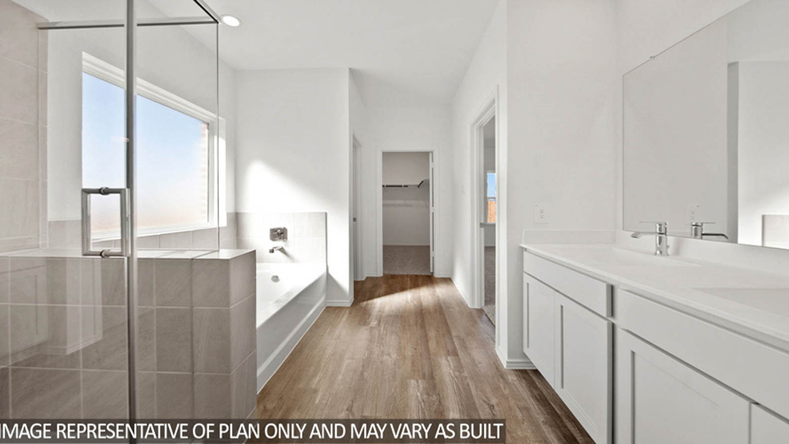 Primary bathroom with tub and shower
