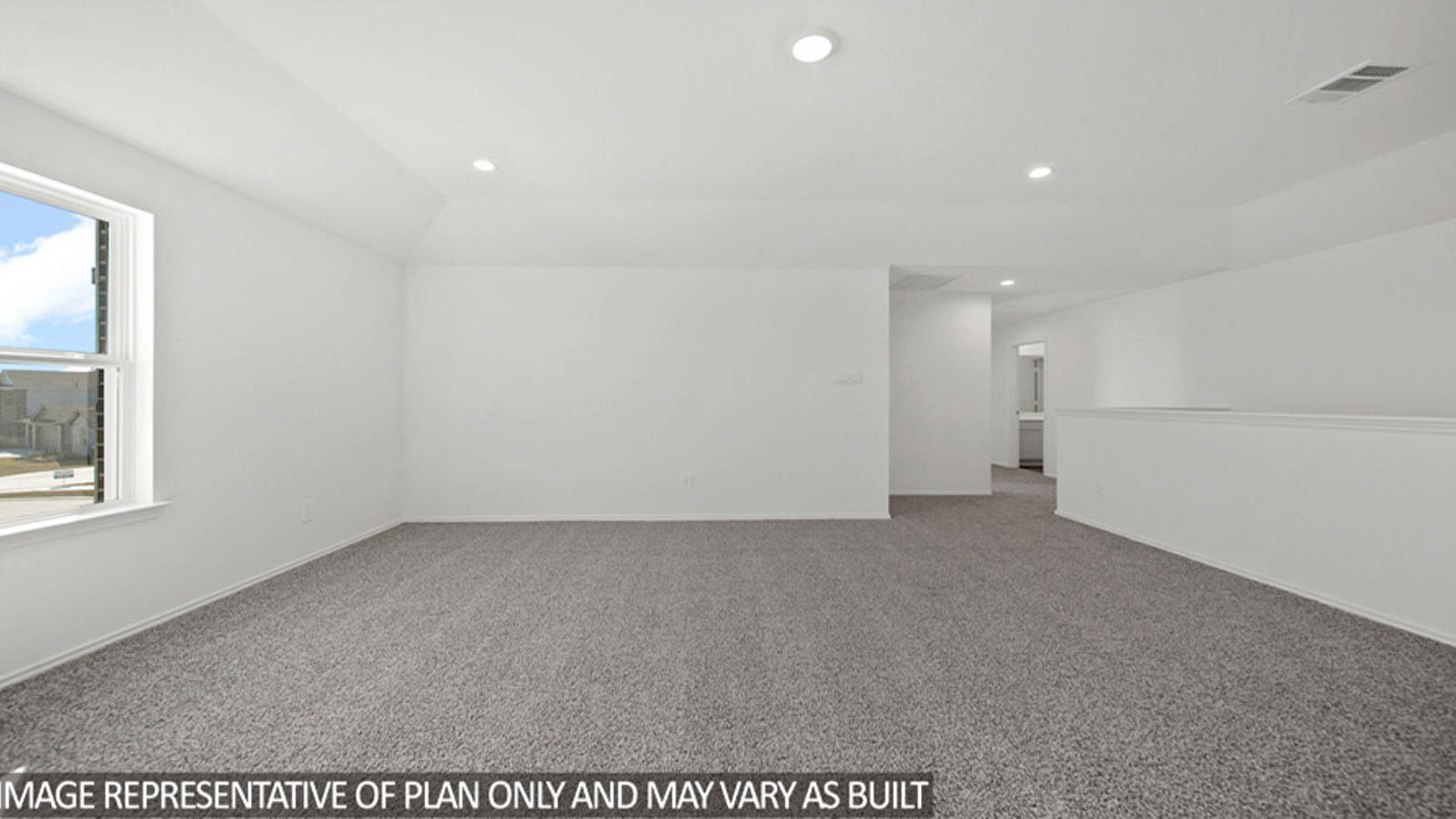 Second story game room with carpet flooring