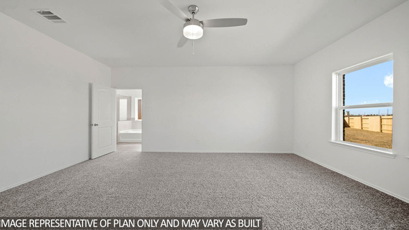 Primary bedroom with bright windows