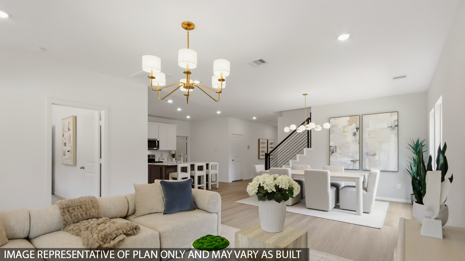 Open concept living, dining, and kitchen area