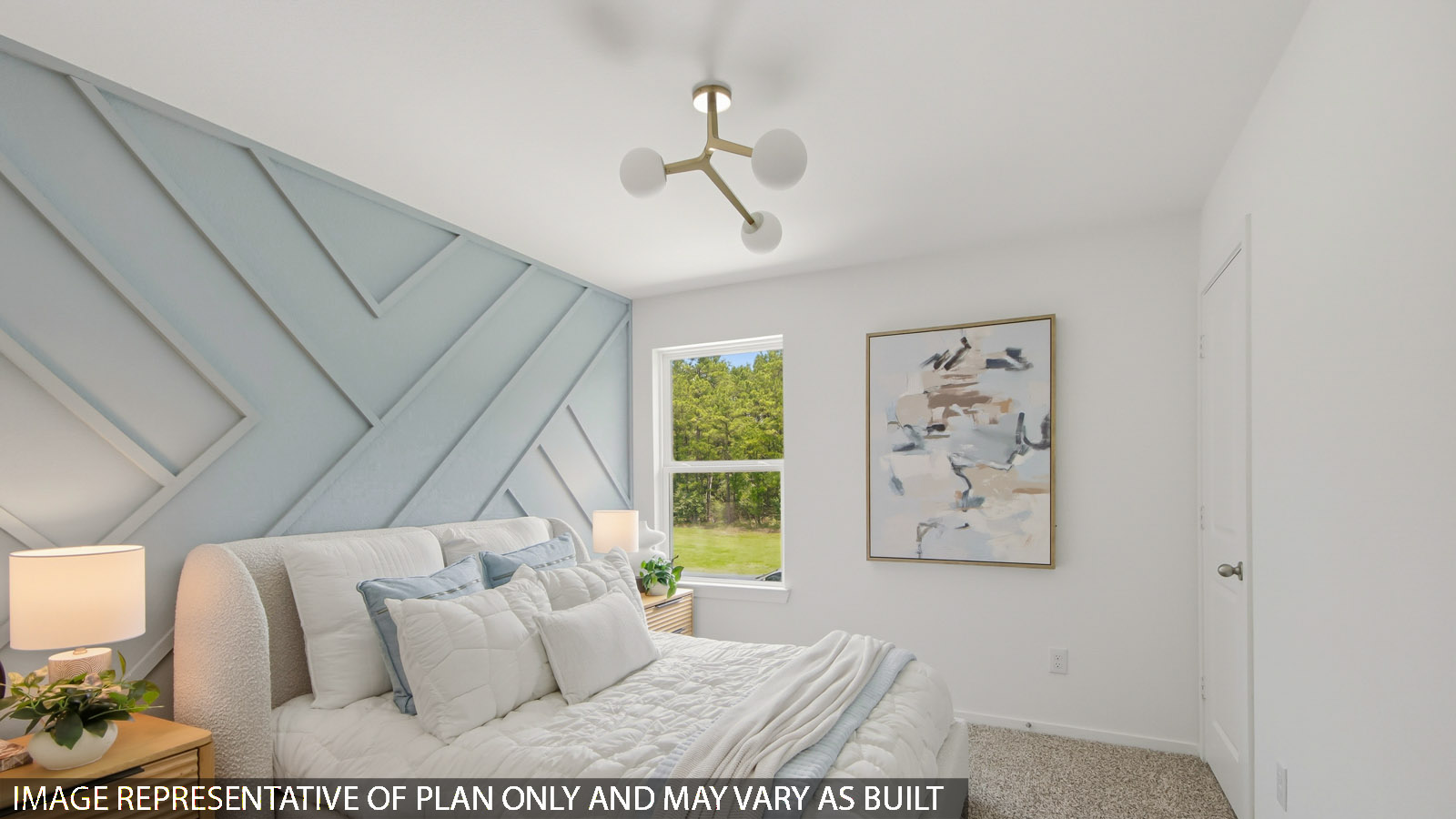 Secondary bedroom with carpet flooring