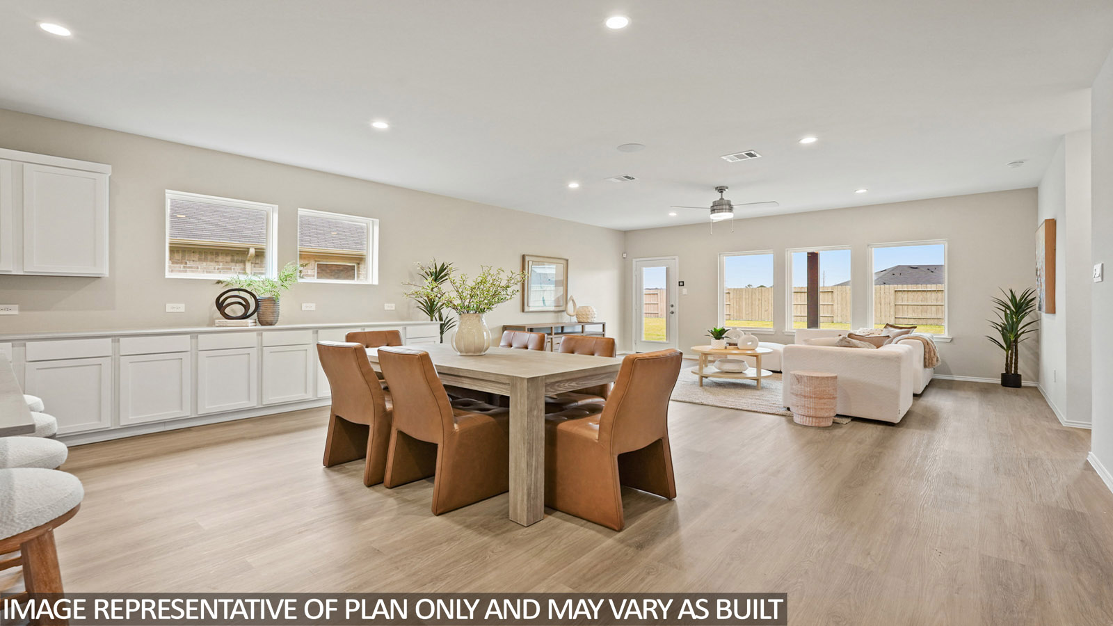 Open concept living, dining, and kitchen area