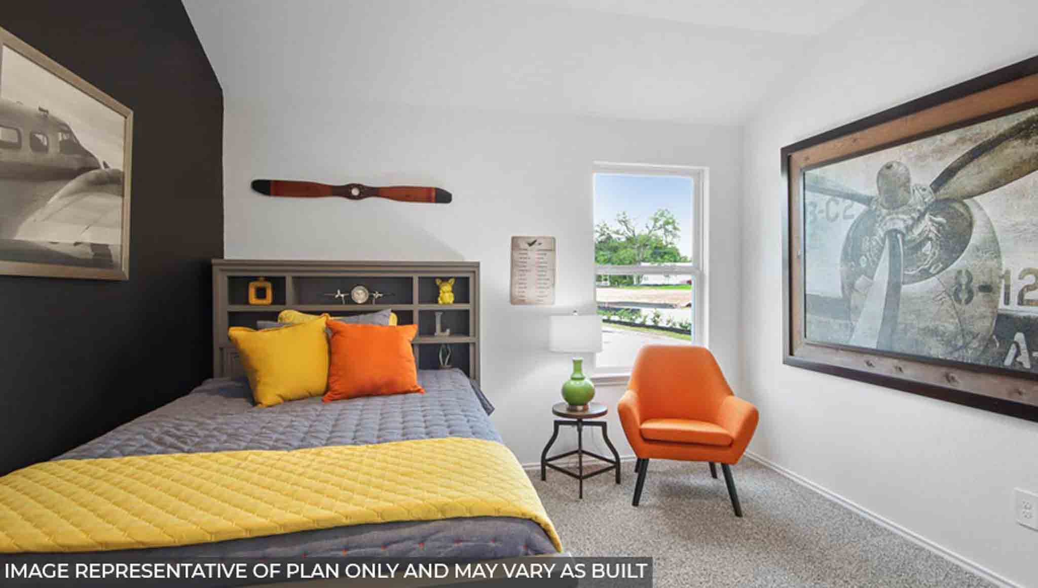 Secondary bedroom with carpet flooring