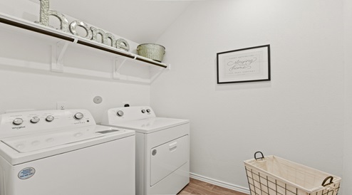 Utility room with overhead storage