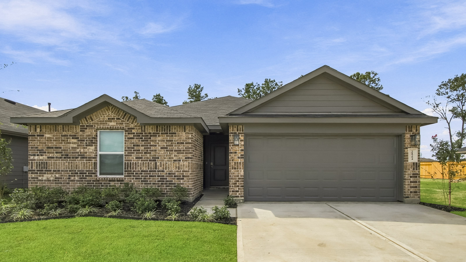 one story home with 2 car garage