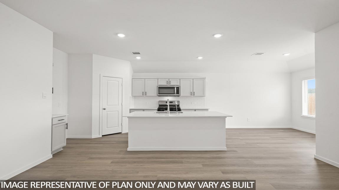 Open concept living, dining, and kitchen area