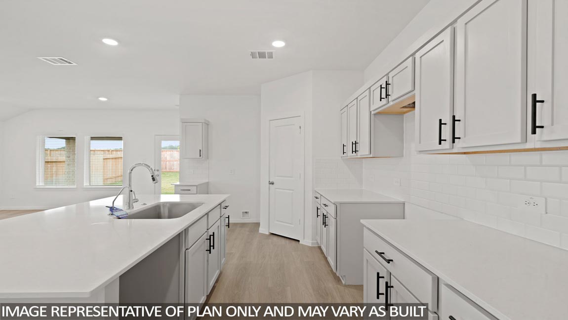 Open concept living, dining, and kitchen area