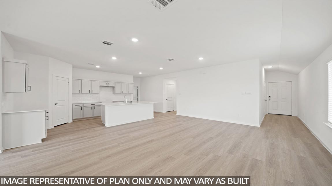 Open concept living, dining, and kitchen area