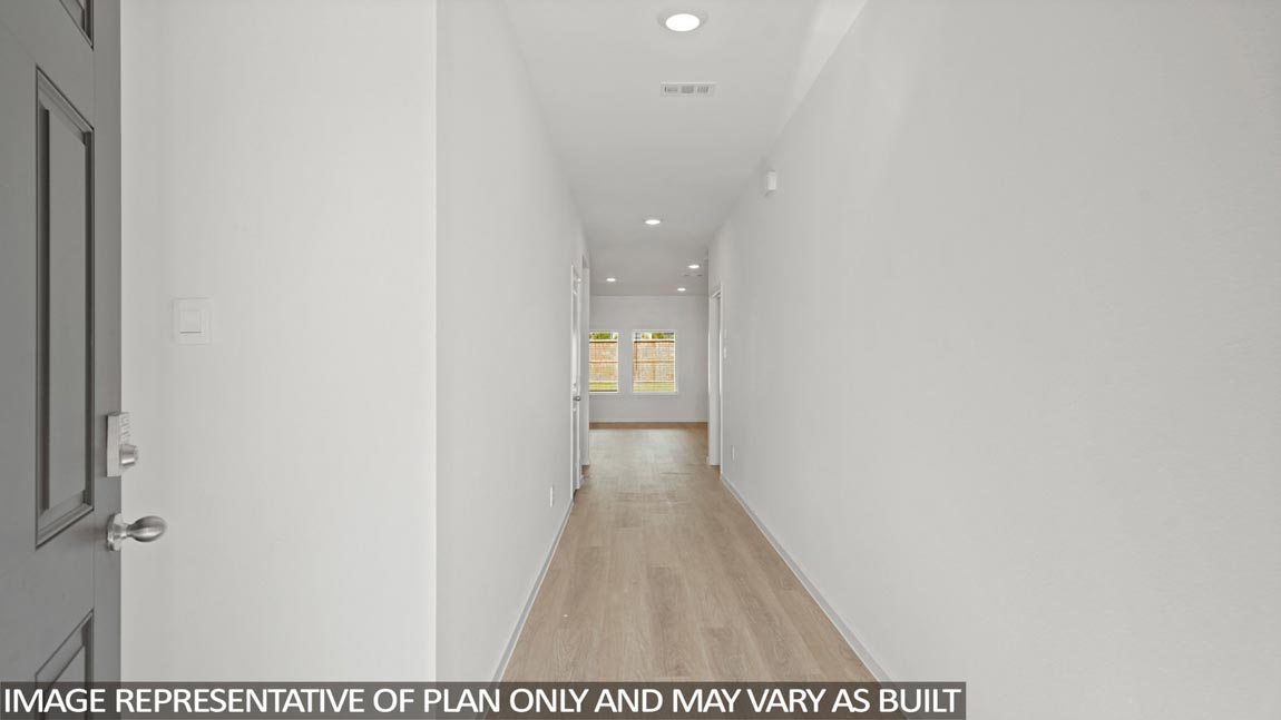 Entry hallway with vinyl flooring