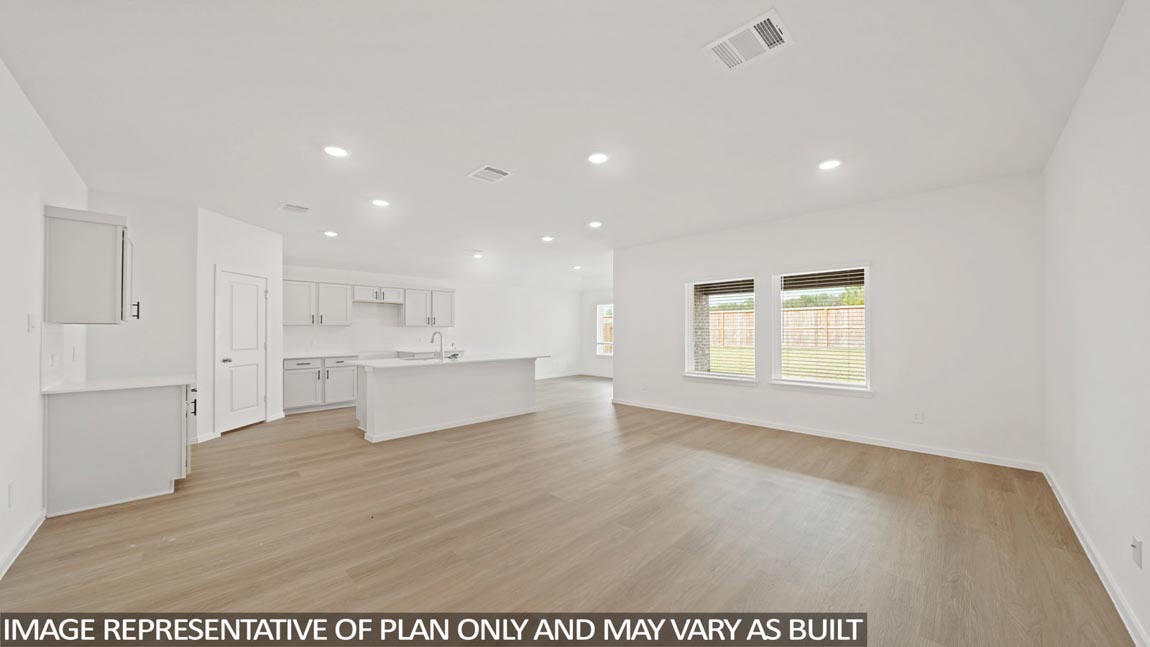 Open concept living, dining, and kitchen area