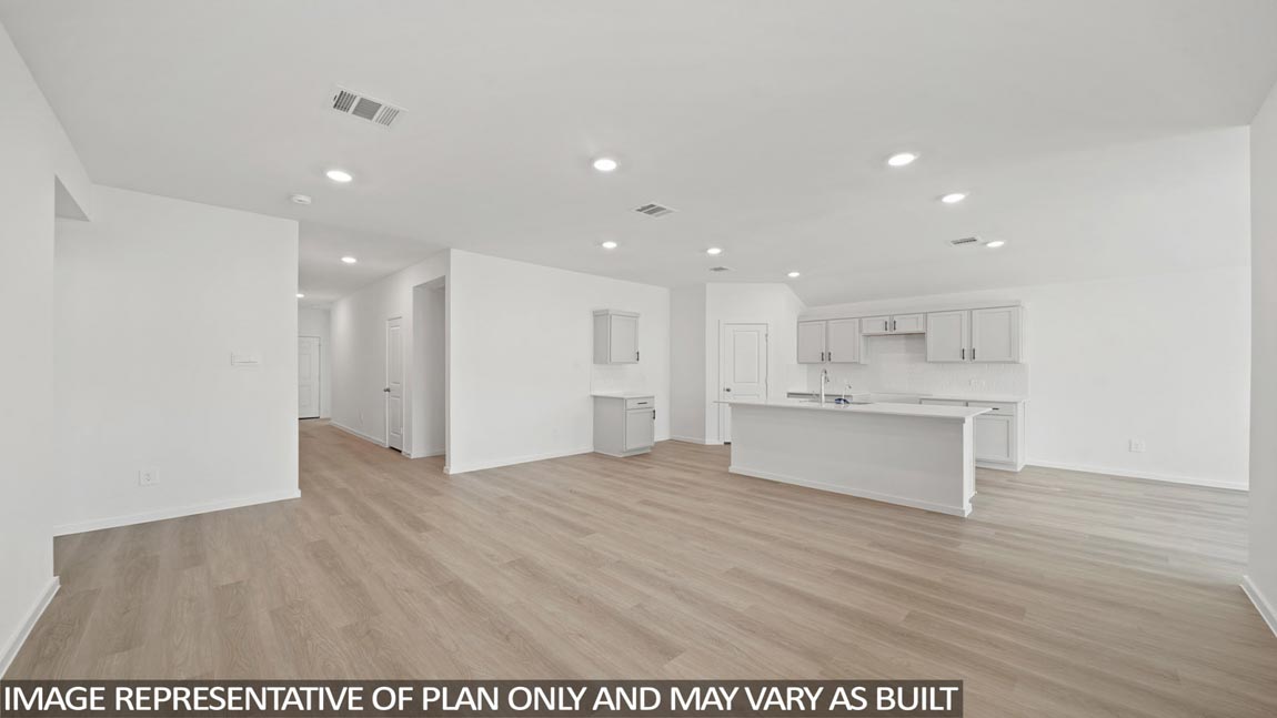 Open concept living, dining, and kitchen area