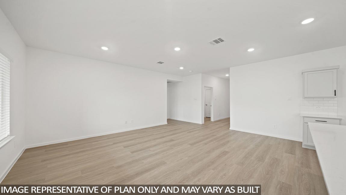 Open concept living, dining, and kitchen area