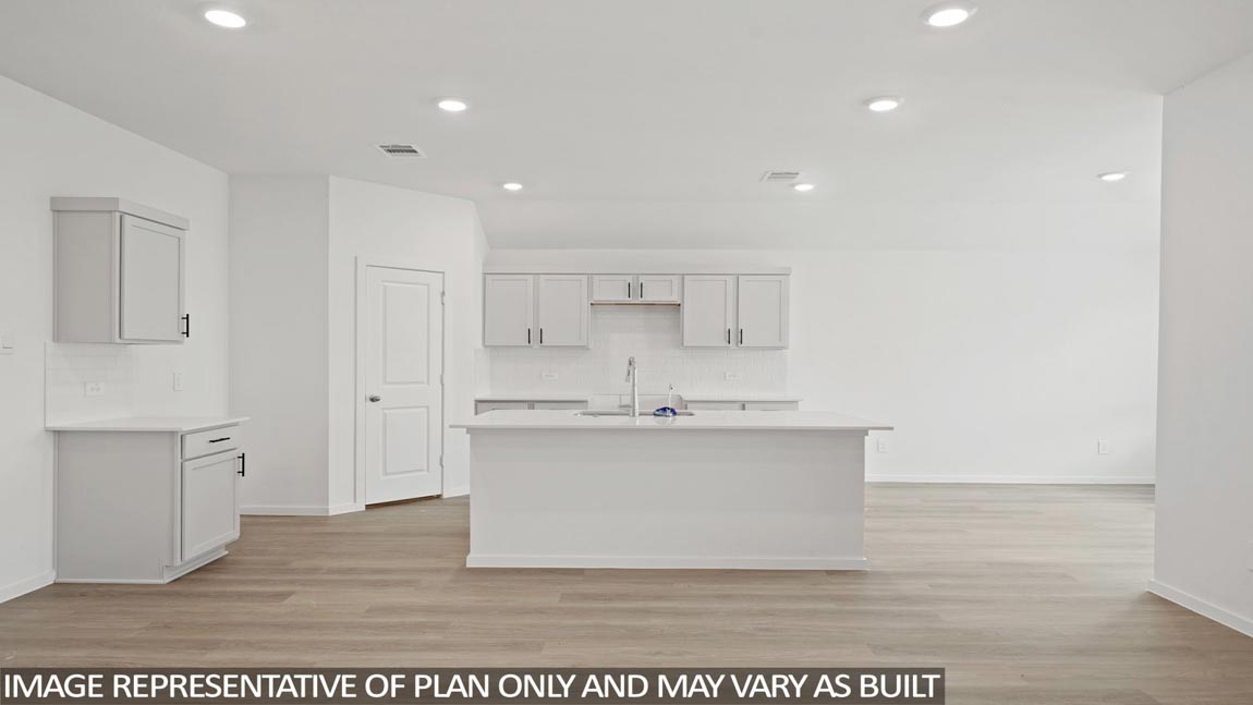 Open concept living, dining, and kitchen area