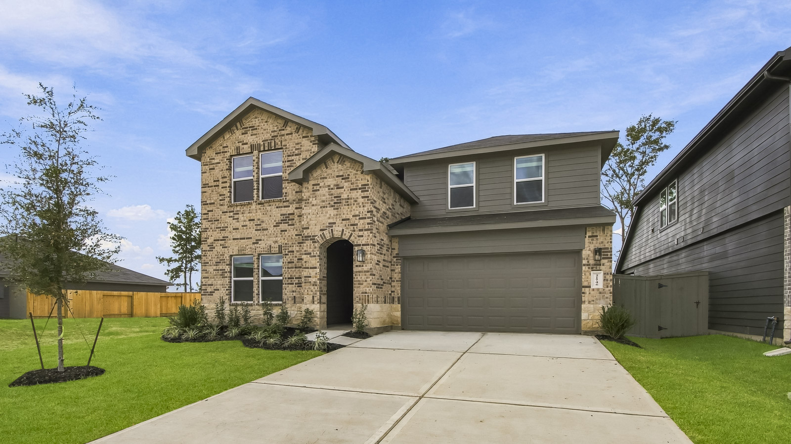 two story home with 2 car garage