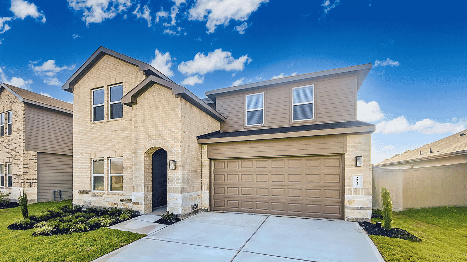 two story home with 2 car garage