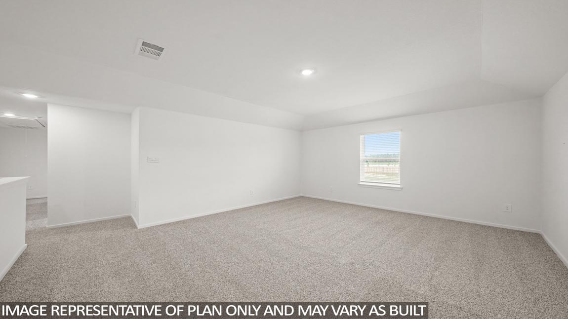 Second story game room with carpet flooring