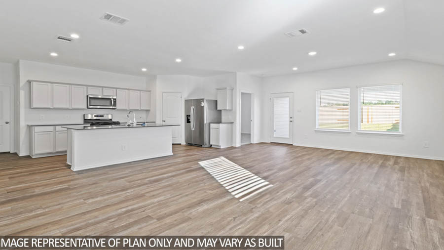 Open concept living, dining, and kitchen area