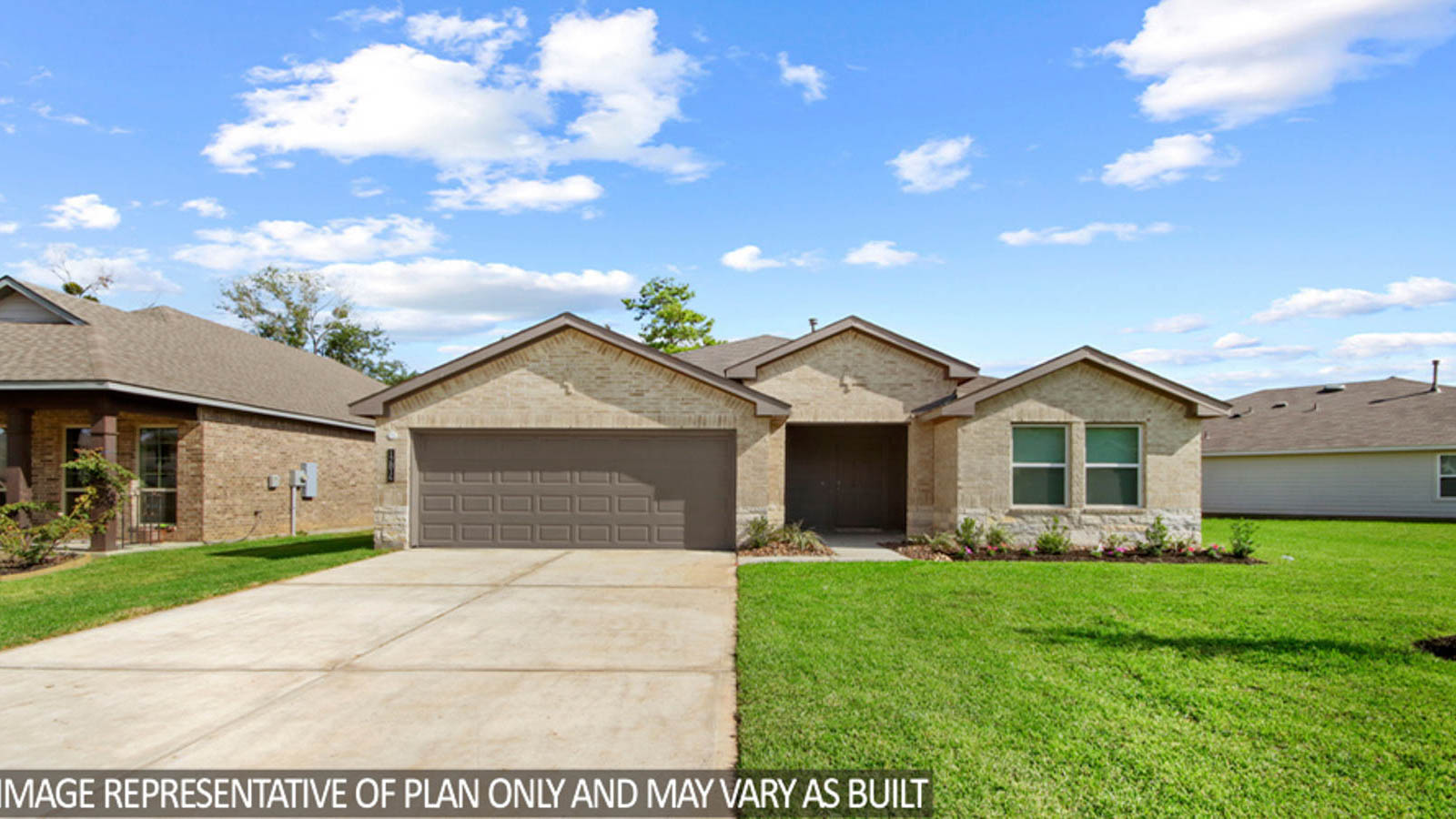 Single-story house with tan trimming and a two-car garage.