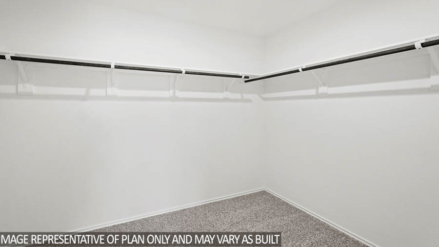 Primary walk-in closet.