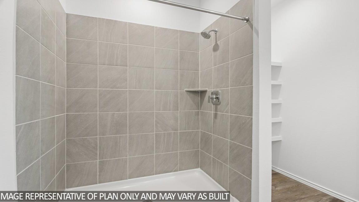 Owner’s ensuite in a D.R. Horton new build home offers function and style with a walk-in closet, spa-like ensuite