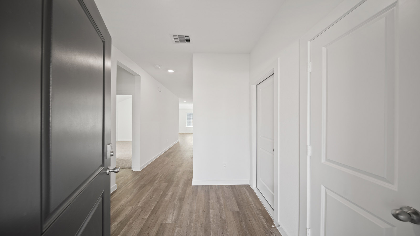 Entry hallway with vinyl flooring