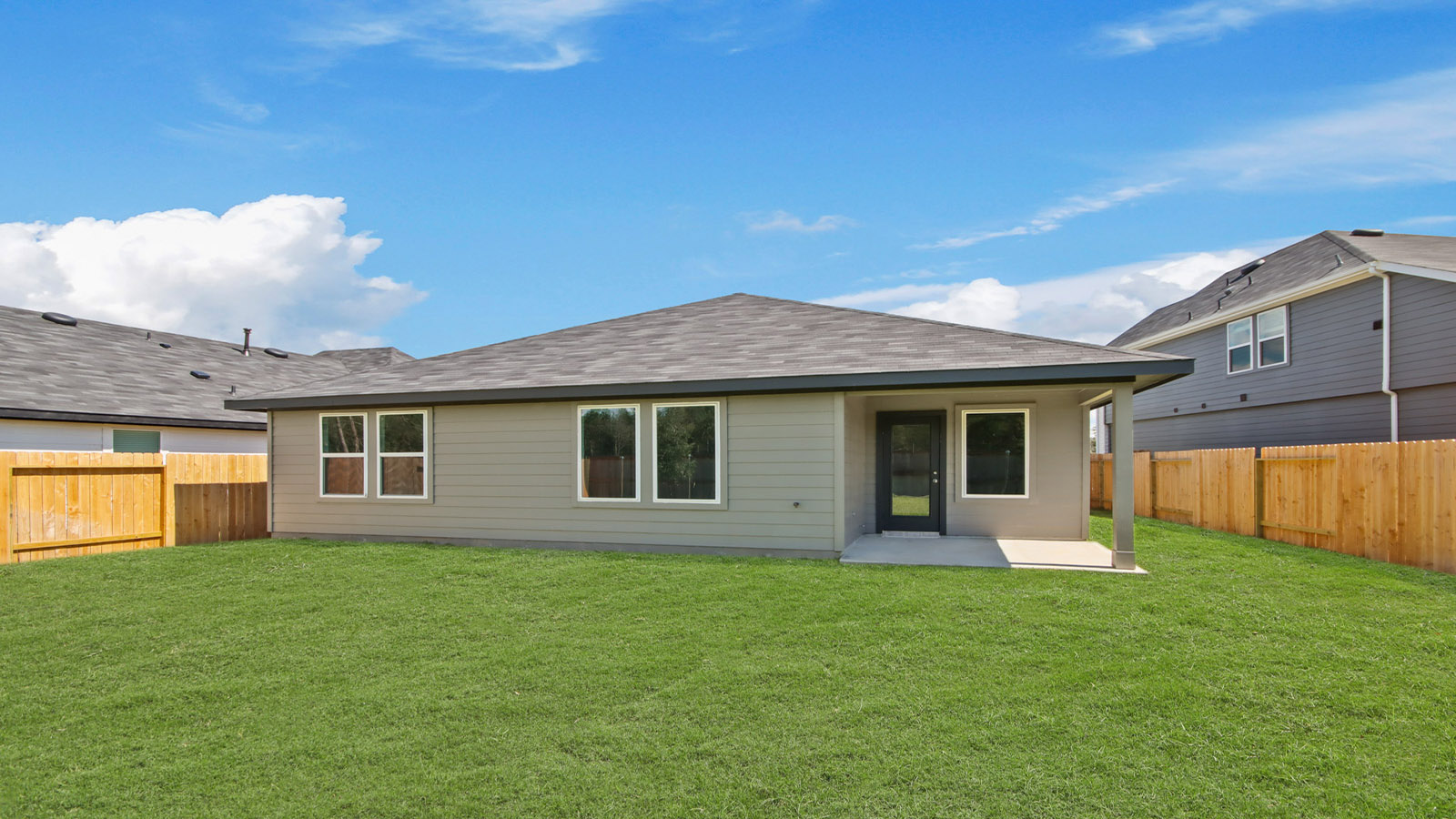 Alternate backyard view highlighting the covered patio and transition from indoor to outdoor space Silverthorne