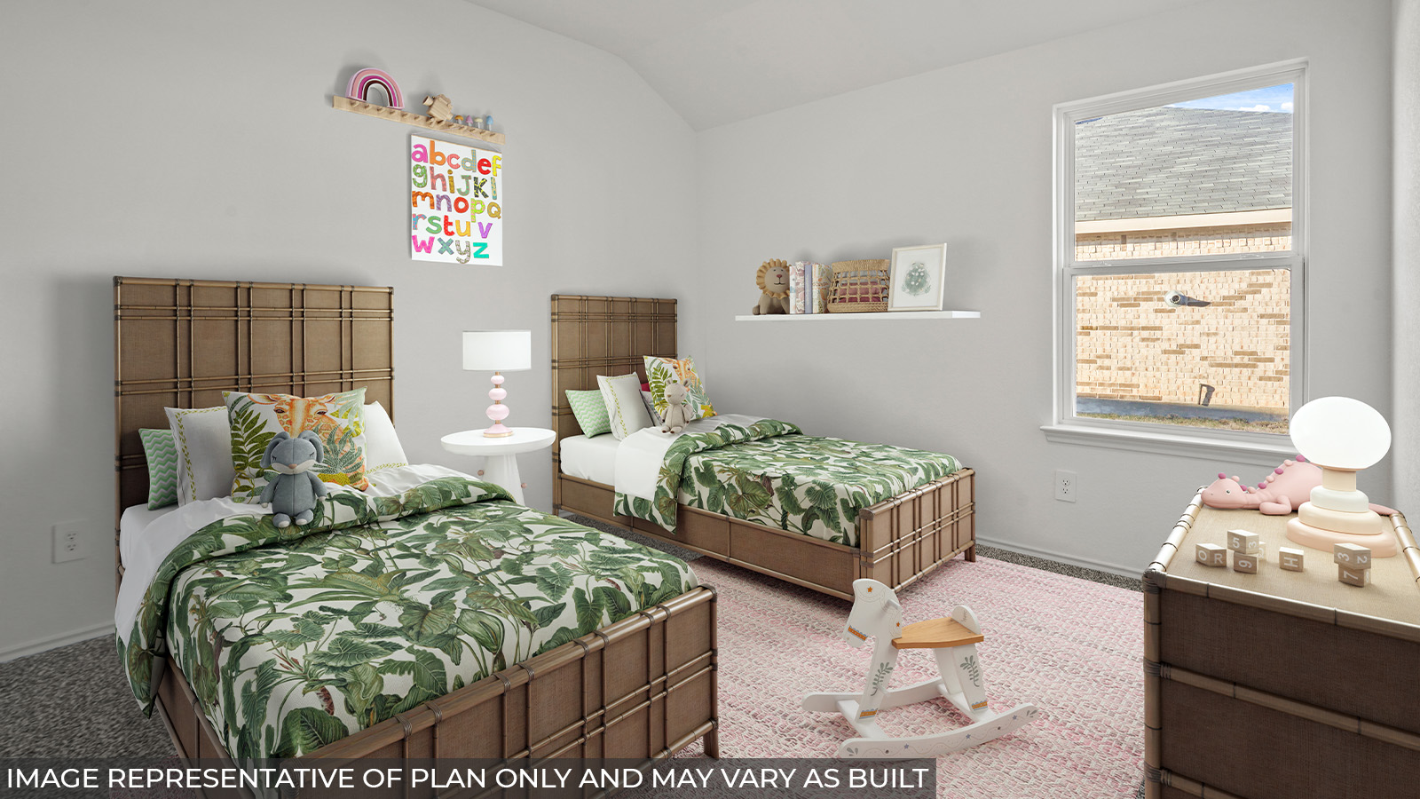 Staged secondary bedroom with carpet flooring and a bright window.