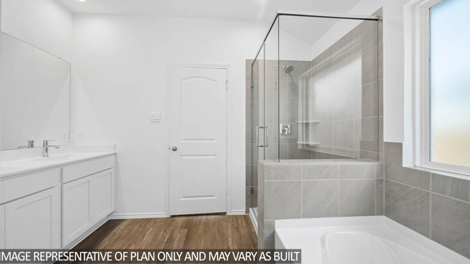 Primary bathroom with tub and shower