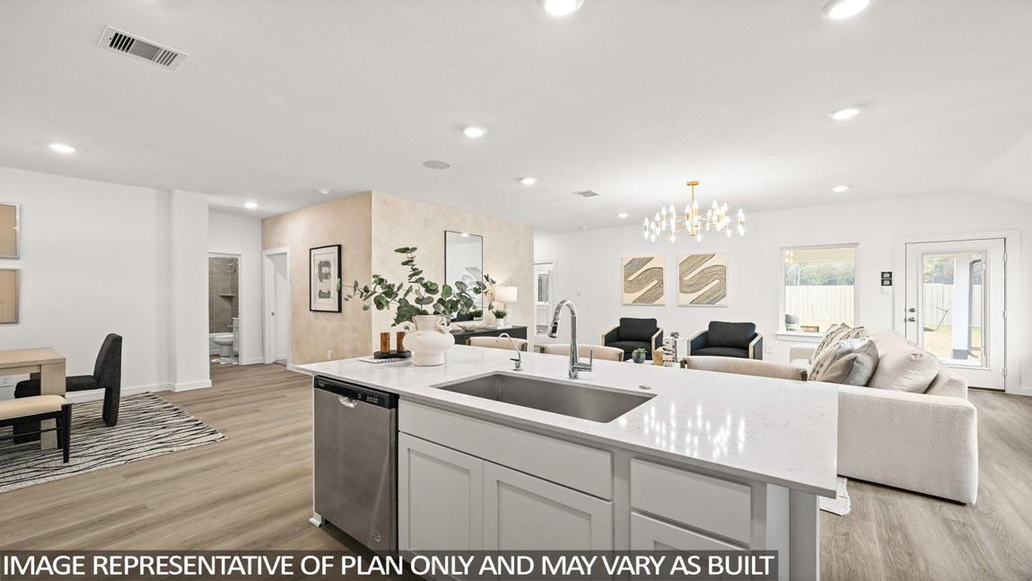 Open concept living, dining, and kitchen area