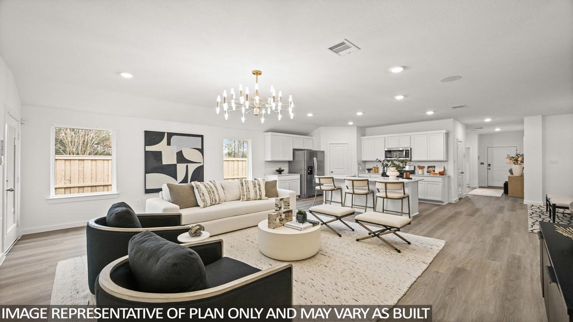 Open concept living, dining, and kitchen area