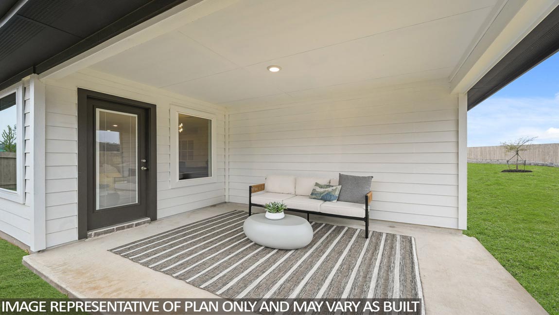 covered patio with overhead lighting