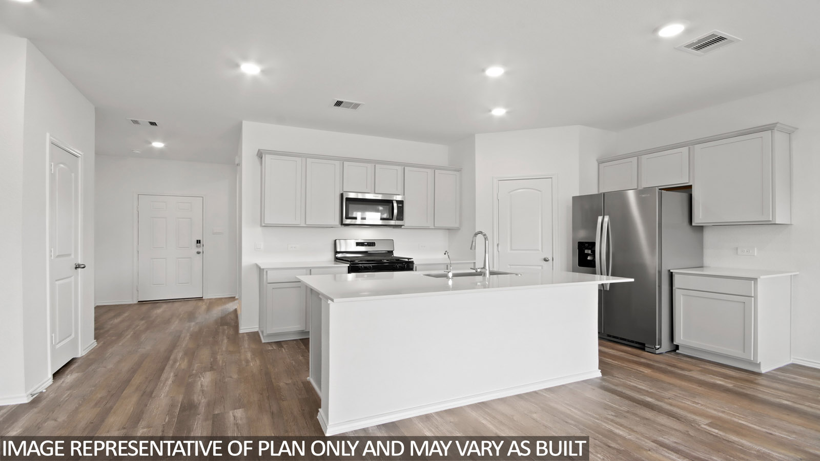 Open concept living, dining, and kitchen area