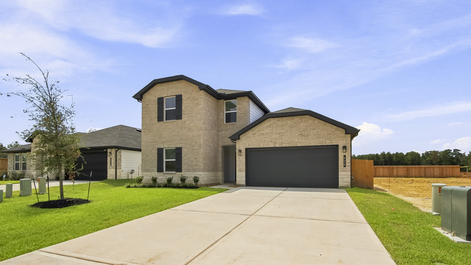 Two story home with two car garage