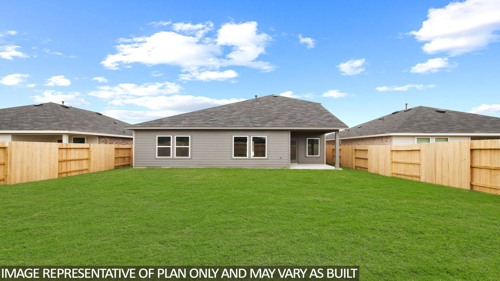 Spacious backyard with a back patio and overhead lights.