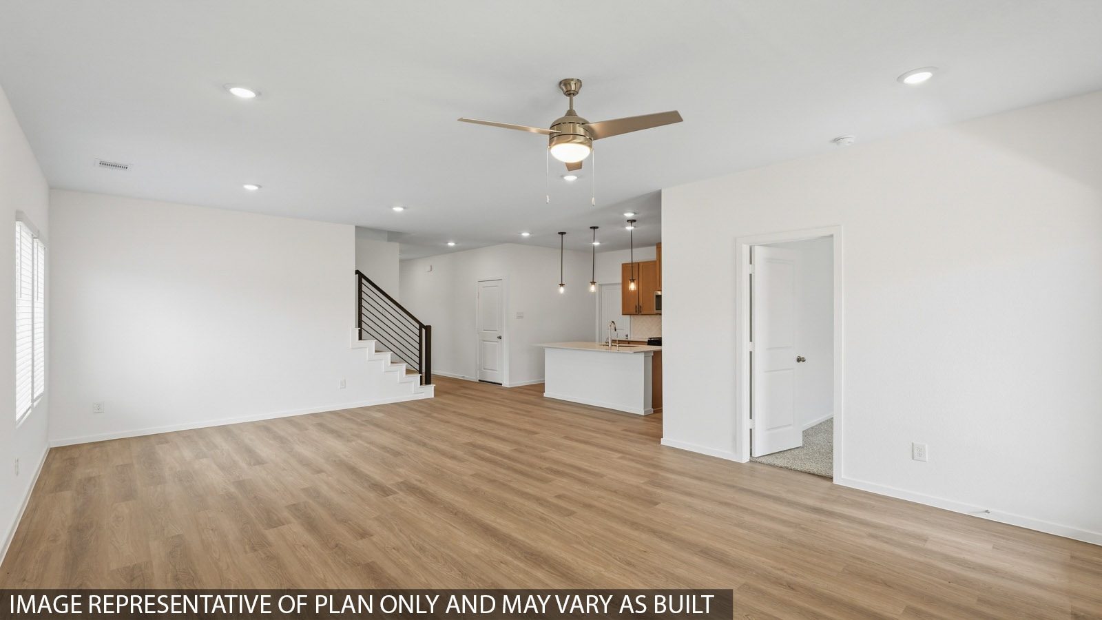 Open concept living, dining, and kitchen area