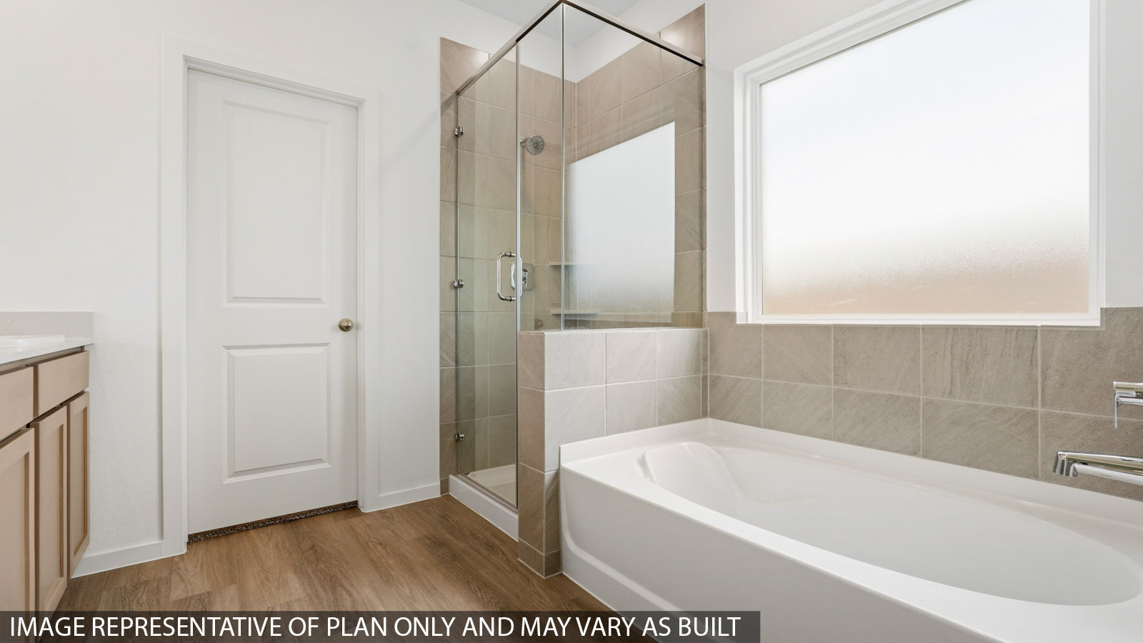 Primary bathroom with tub and shower