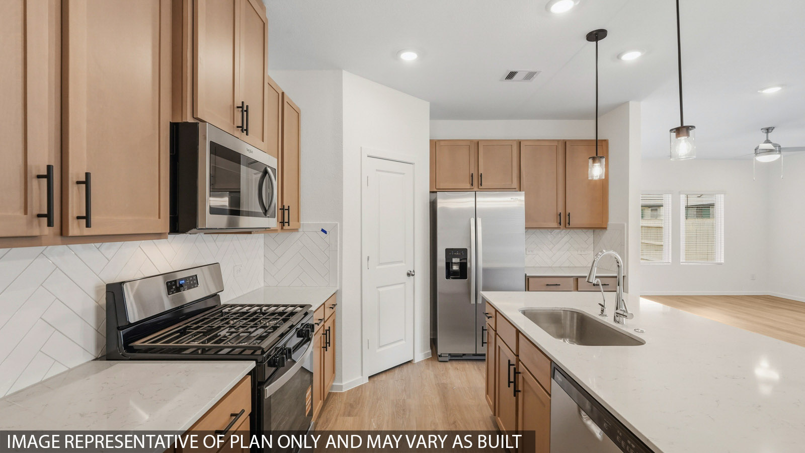 Open concept living, dining, and kitchen area