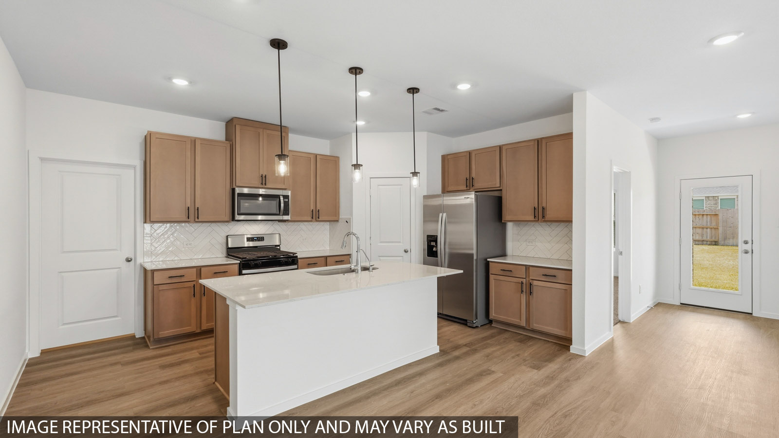 Open concept living, dining, and kitchen area